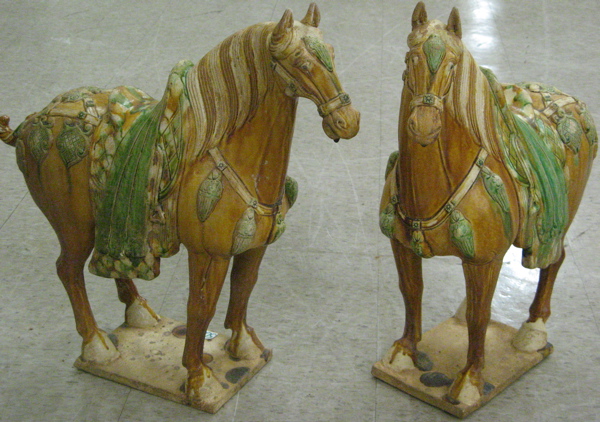 Appraisal: PAIR TANG STYLE CHINESE HORSES clay glazed with green and