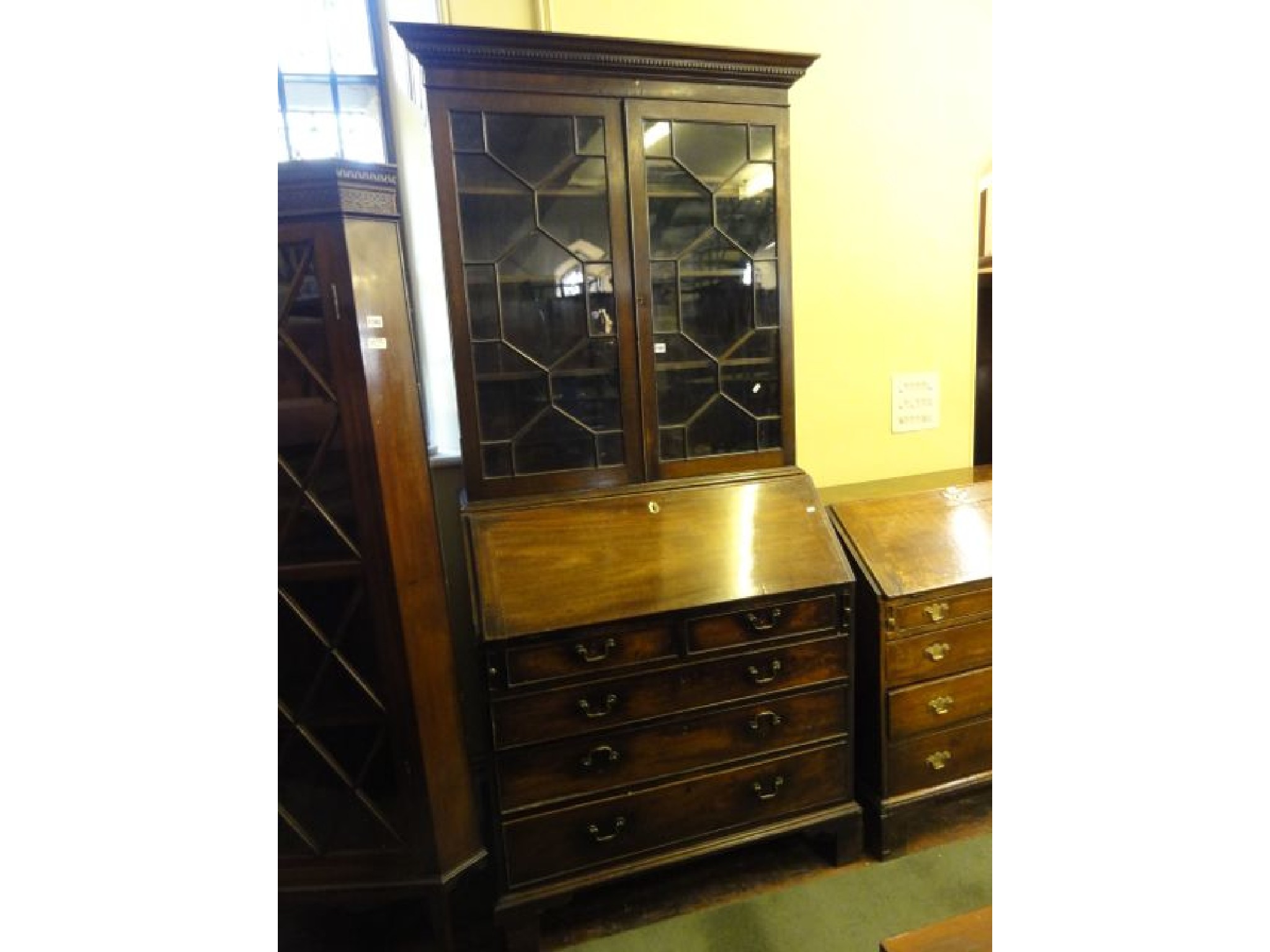 Appraisal: A Georgian mahogany bureau bookcase the bureau fitted with an