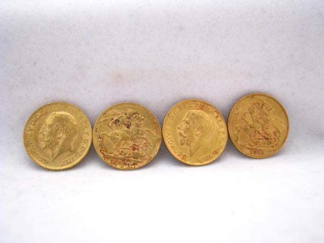 Appraisal: Four gold coins George V British Sovereigns three are one