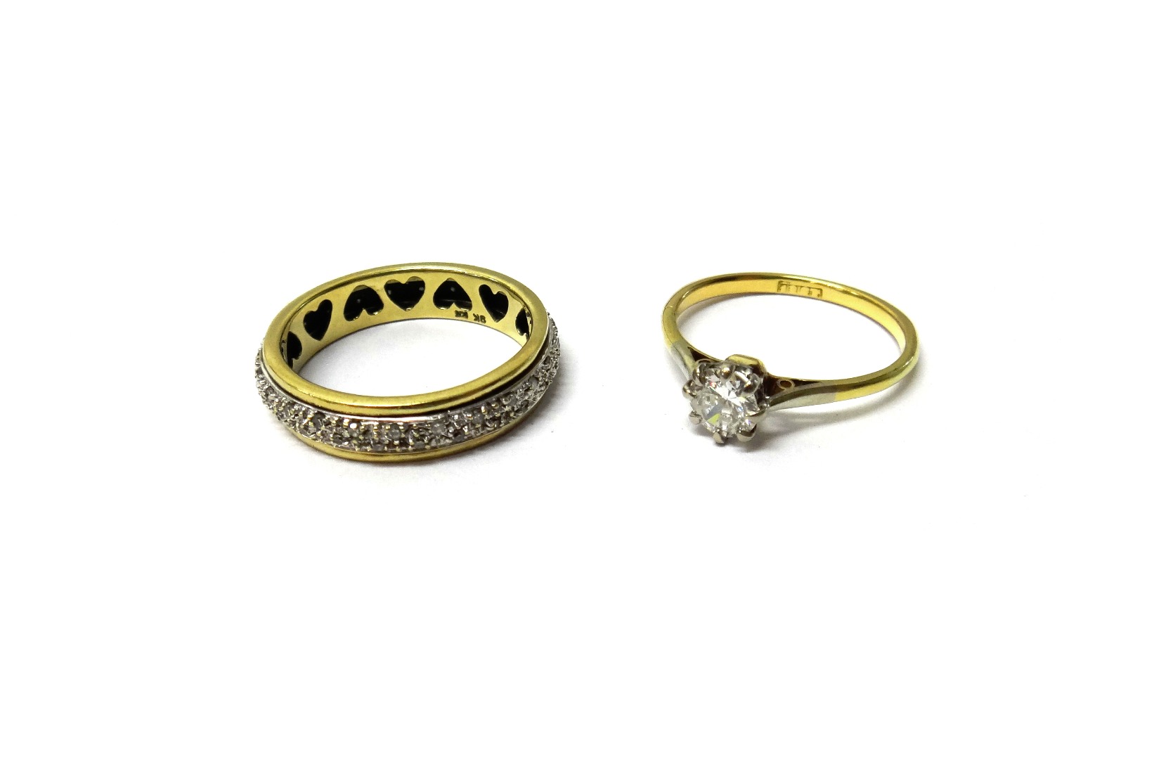 Appraisal: A gold and diamond set single stone ring claw set