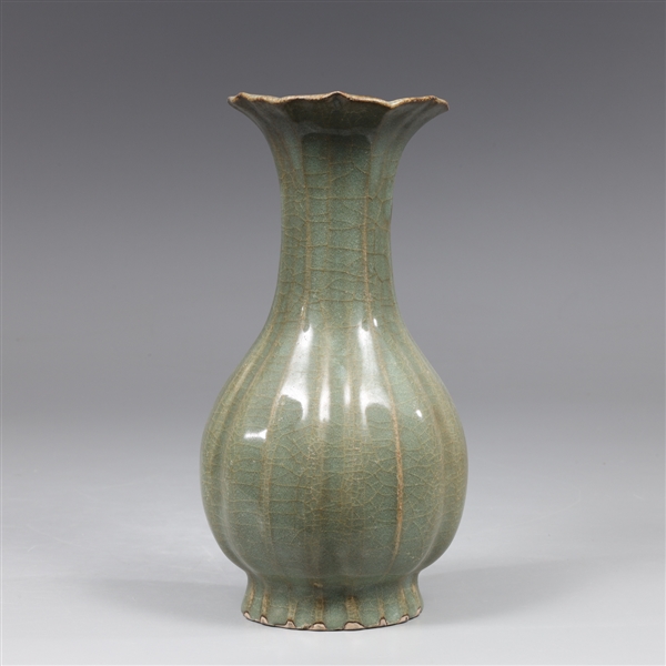 Appraisal: Chinese celadon crackle glazed porcelain vase with molded rim overall