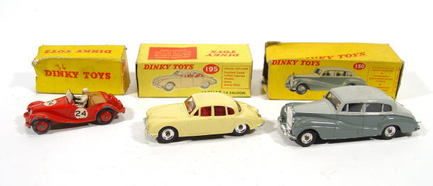 Appraisal: Three boxed Dinky Toy cars - Jaguar Saloon MG Midget