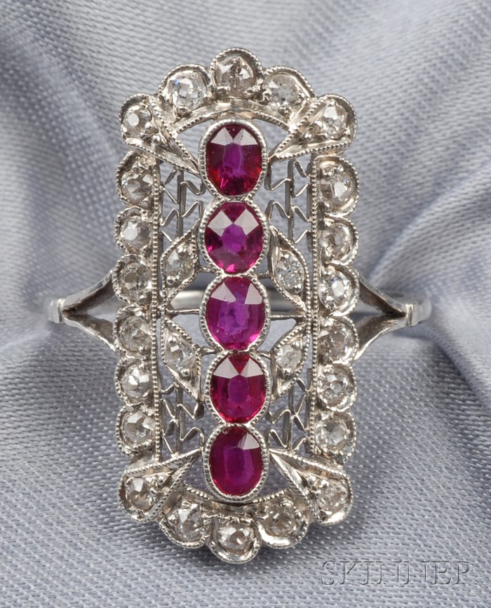 Appraisal: Platinum Ruby and Diamond Ring centering a line of cushion-shape