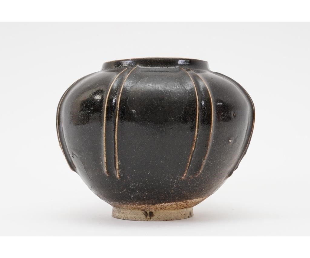 Appraisal: Chinese northern blackware jar with vertical line decoration h x