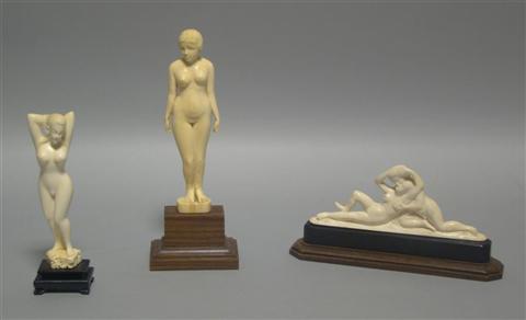 Appraisal: THREE EROTIC CARVINGS Two standing figures of ladies and the