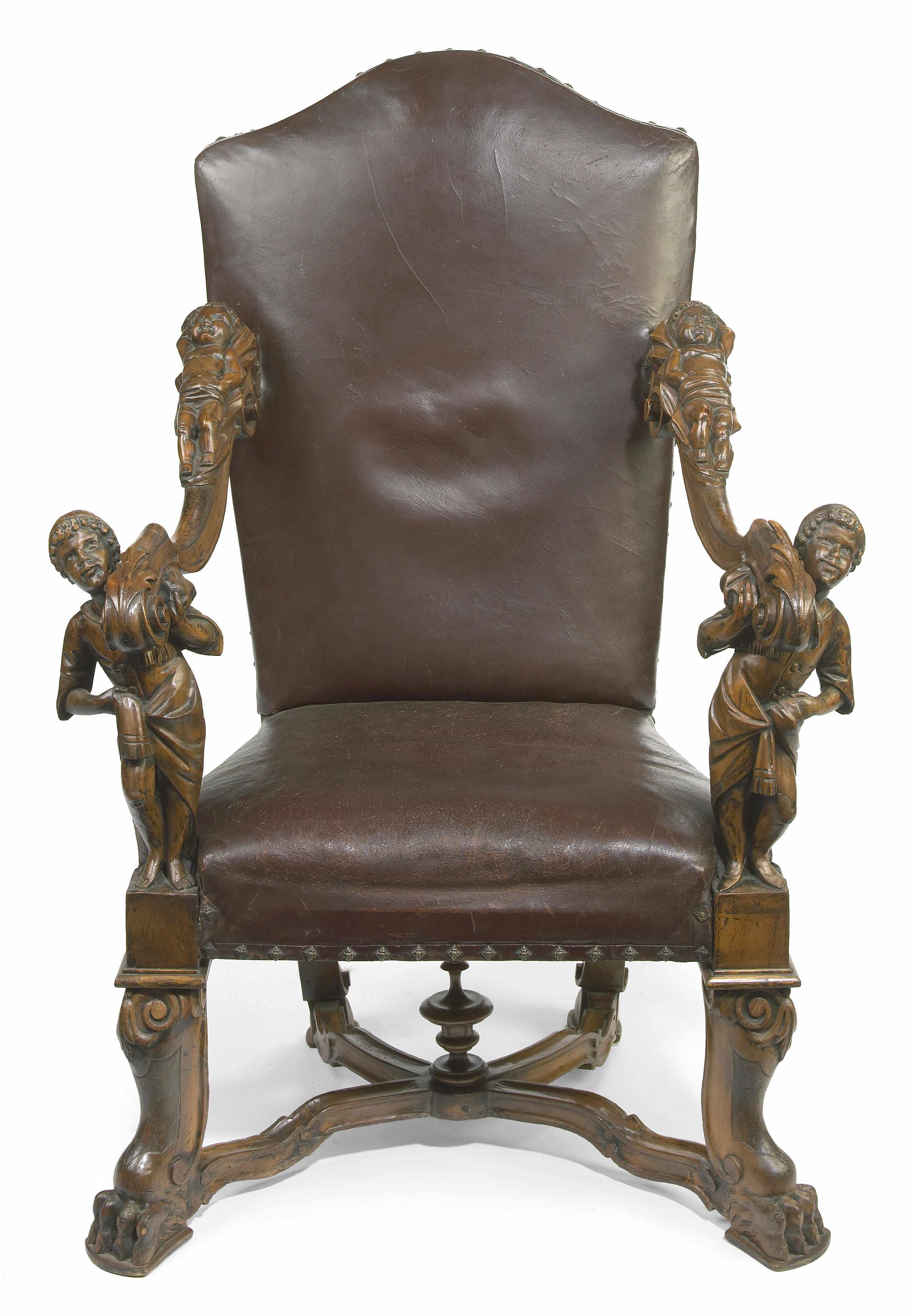 Appraisal: An Italian Baroque style carved walnut armchair in the manner