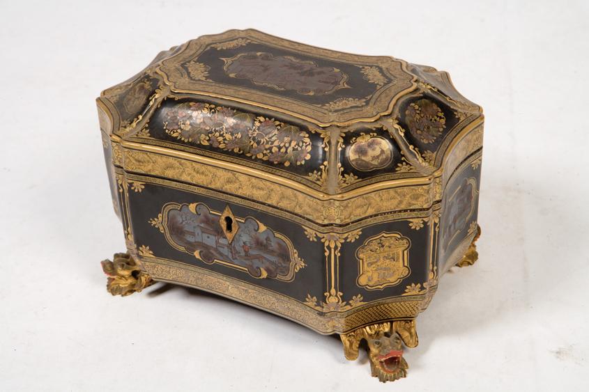 Appraisal: A CHINESE EXPORT LACQUER TEA CADDY of shaped rectangular form