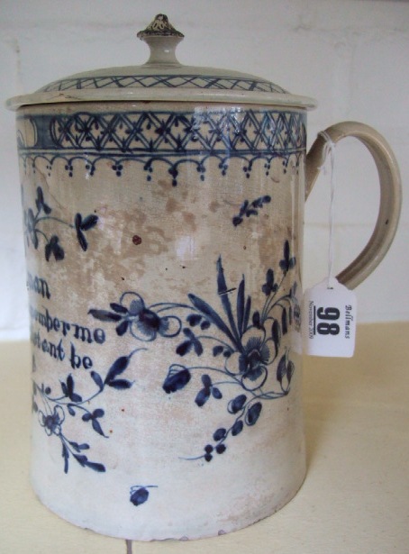 Appraisal: A tin glaze earthenware tankard late th Century decorated in