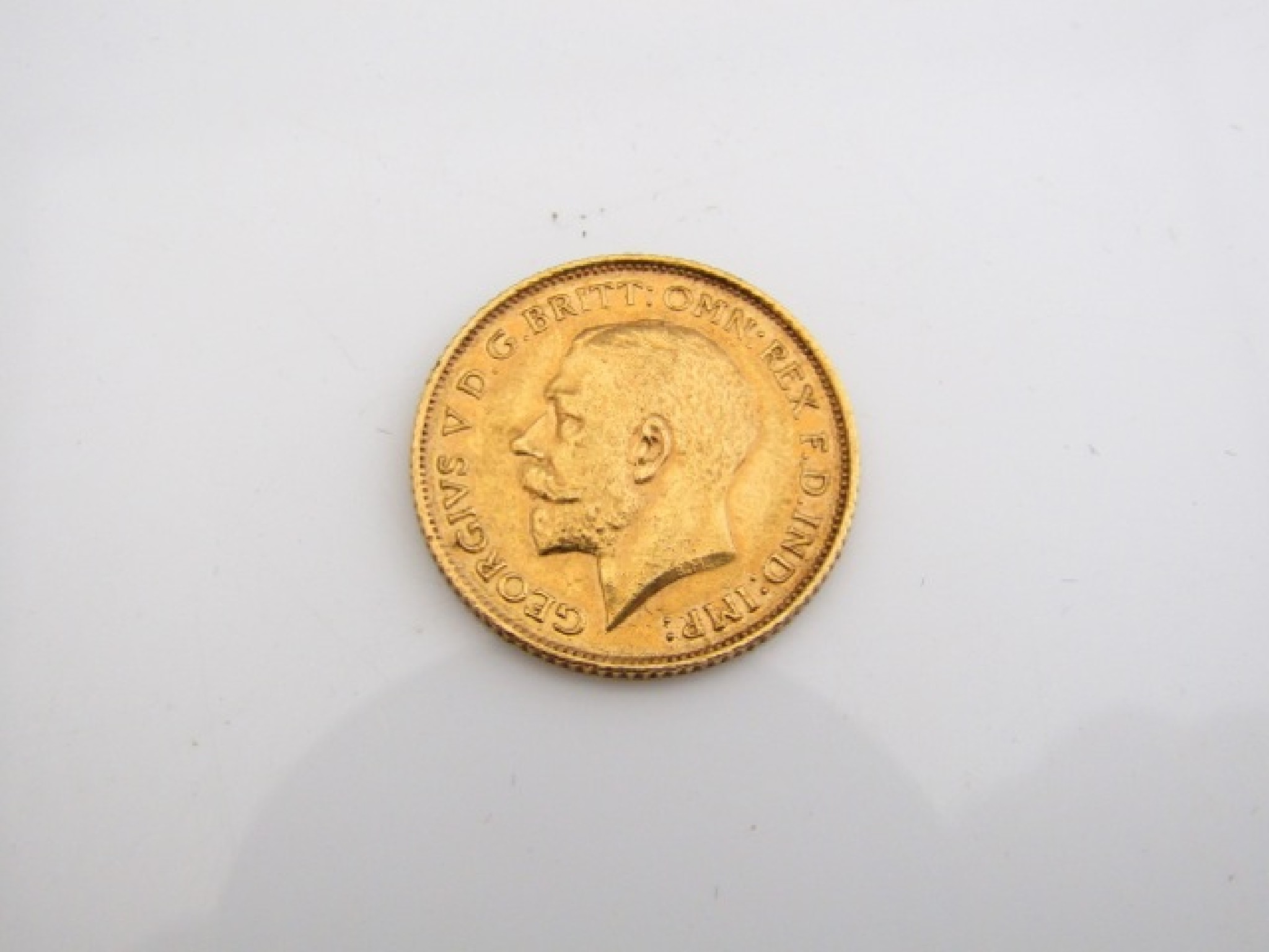 Appraisal: A George V half-sovereign g