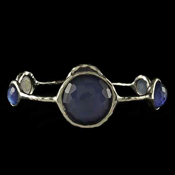 Appraisal: Ippolita Sterling Silver Quartz Bangle Ippolita hand-hammered sterling bangle containing