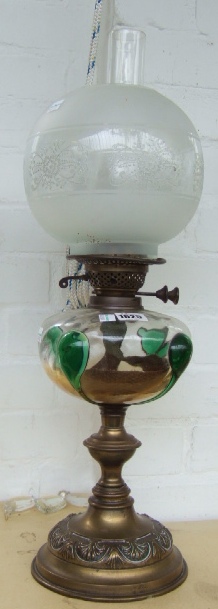 Appraisal: A Victorian brass and glass oil lamp the clear glass