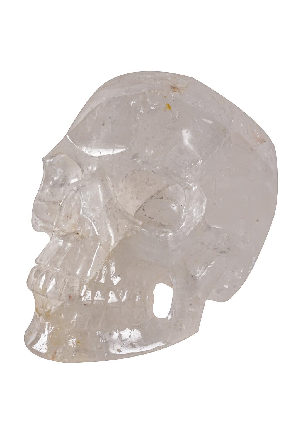 Appraisal: CARVED ROCK CRYSTAL SKULL th century Condition visible fracturing to