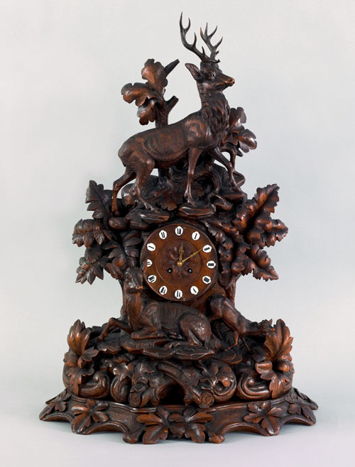 Appraisal: Black Forest carved mantle clock late th c with a