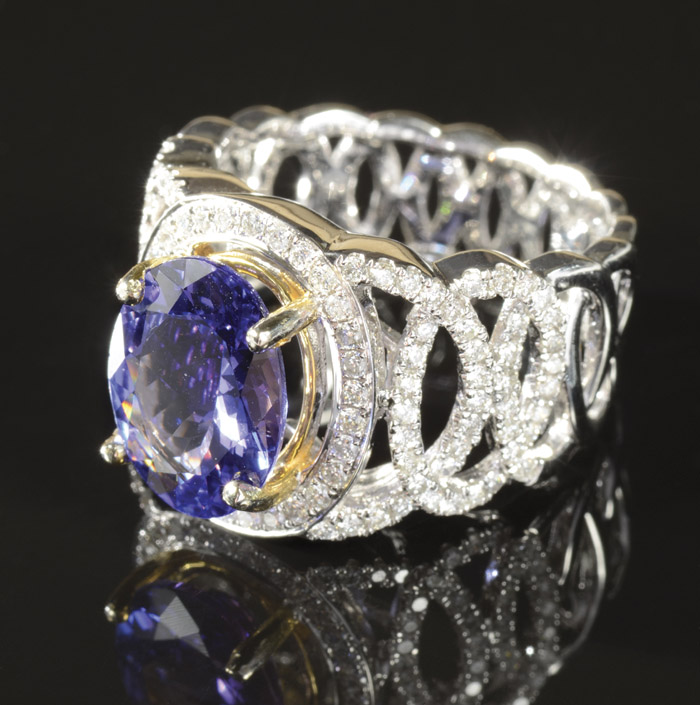 Appraisal: TANZANITE DIAMOND AND FOURTEEN KARAT GOLD RING The white and