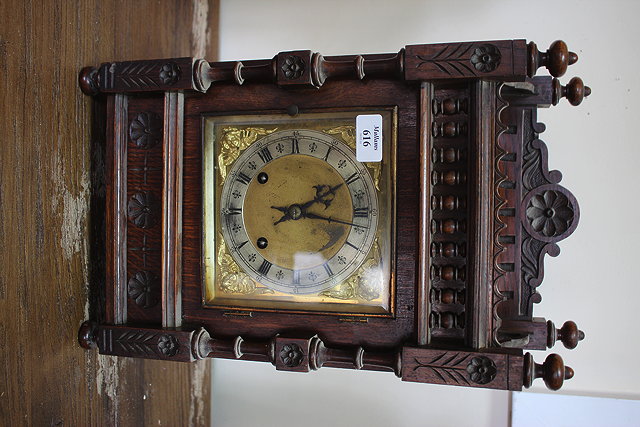 Appraisal: A 'S OAK CASED MANTLE CLOCK with a brass and