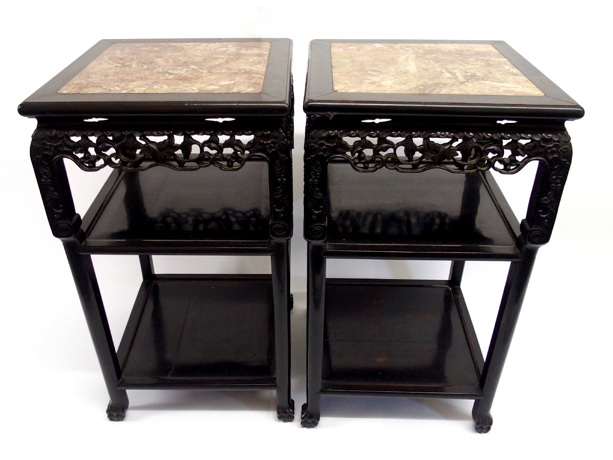 Appraisal: A pair of Chinese hardwood pedestals with inset marble topsabove