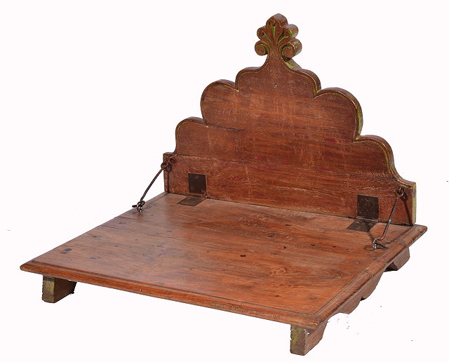 Appraisal: AN ANTIQUE INDIAN SINGHASAN ALTAR TABLE with hinged shaped back