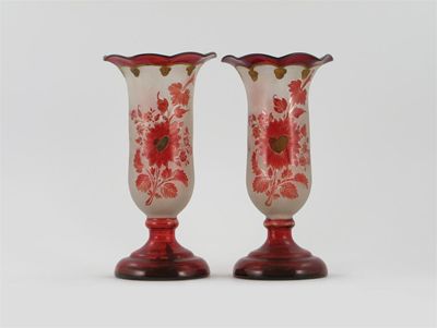 Appraisal: A pair of ruby-flashed glass vases each decorated with two