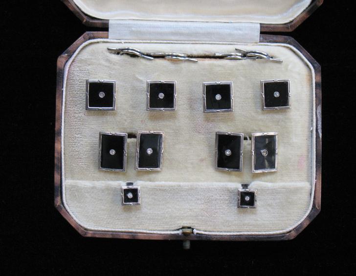 Appraisal: A CASED SET OF SILVER AND ONYX DRESS STUDS AND