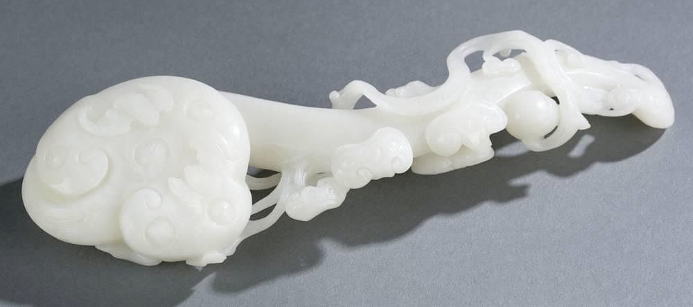 Appraisal: Chinese carved white jade linzhi A Chinese carved white jade