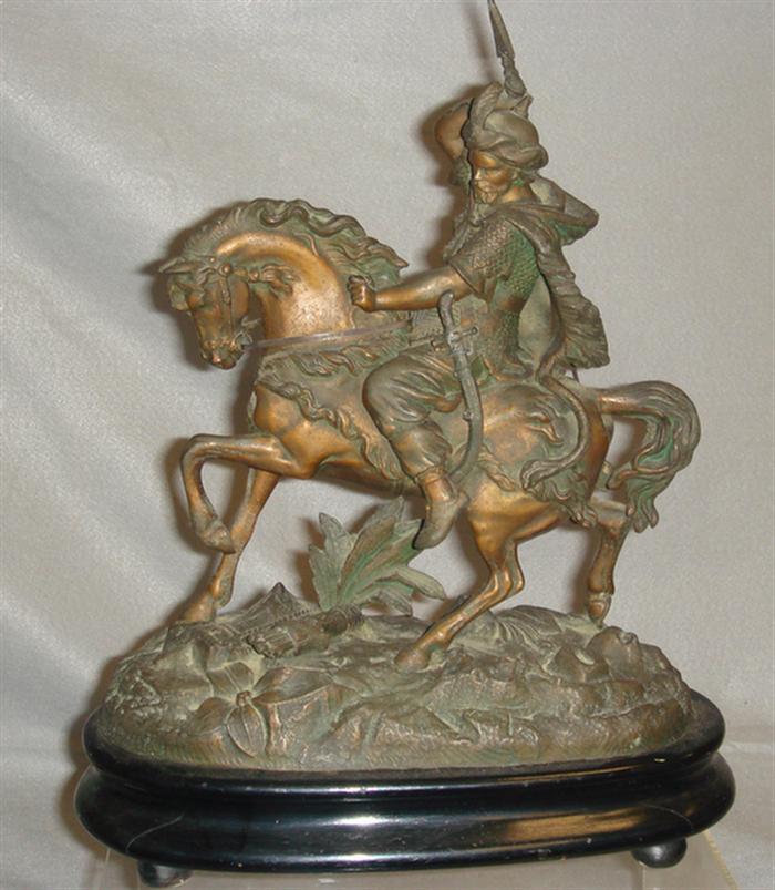 Appraisal: white metal sculptures mounted warrior with spear high on black