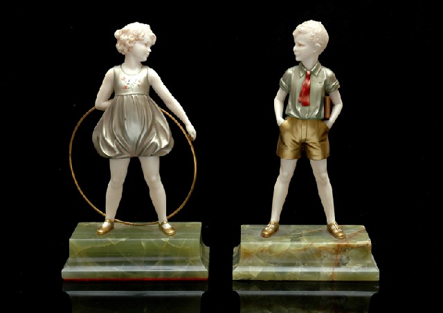 Appraisal: TWO ART DECO PATINATED BRONZE AND IVORY FIGURES 'SONNY BOY'