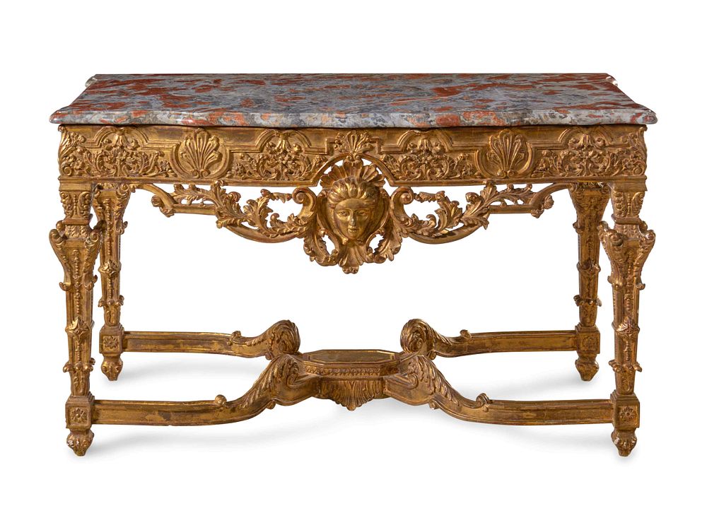 Appraisal: An Italian Carved Giltwood Marble-Top Console Table An Italian Carved