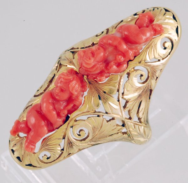 Appraisal: Coral gold ring K yellow gold Pierced and engraved large