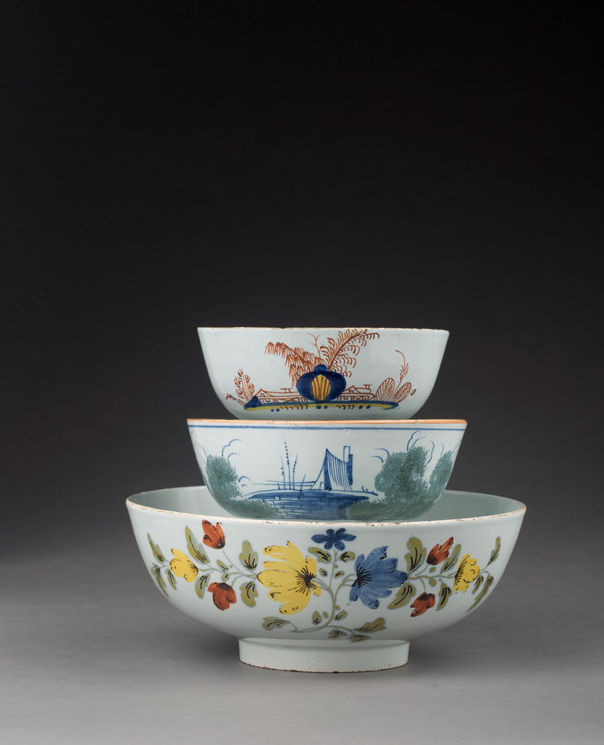 Appraisal: THREE LONDON LIVERPOOL AND BRISTOL DELFT POLYCHROME BOWLS CIRCA -