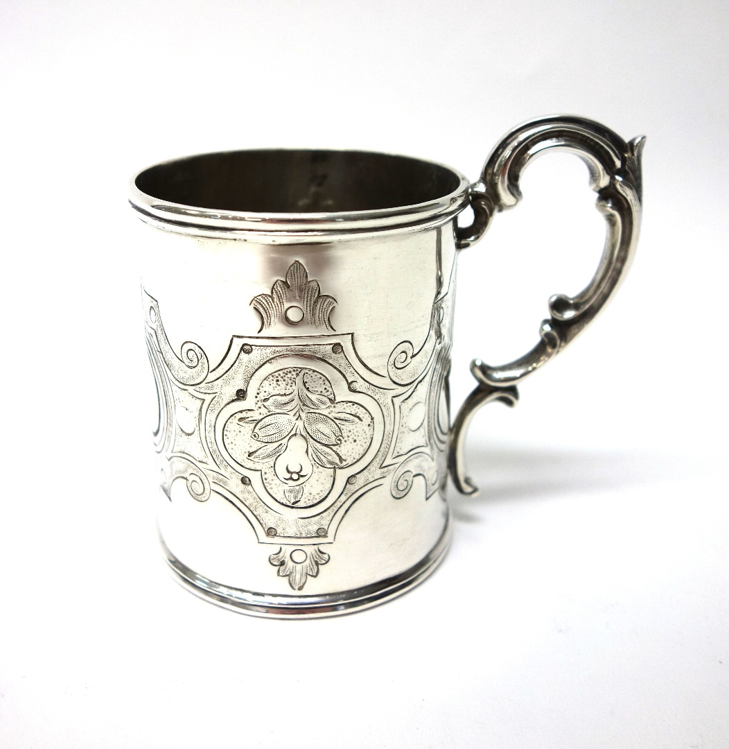 Appraisal: A Victorian silver christening mug of cylindrical form engraved with