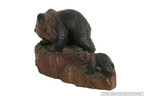 Appraisal: AINU INDIAN CARVING OF MOTHER BEAR CUB W x H