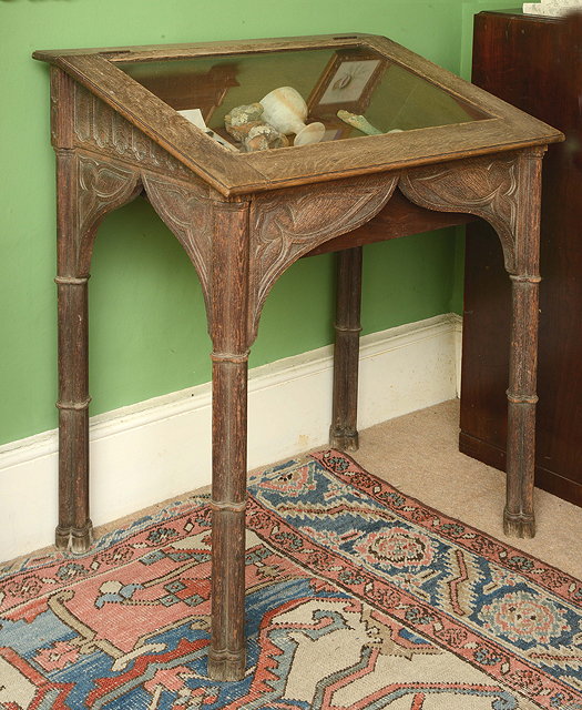 Appraisal: AN OLD OAK GOTHIC REVIVAL DISPLAY CABINET with cluster column