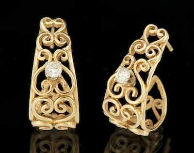 Appraisal: A Pair of Gold and Diamond Earrings k yellow gold