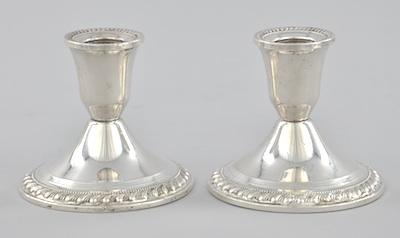 Appraisal: A Pair of Sterling Silver Candlesticks An elegant pair of