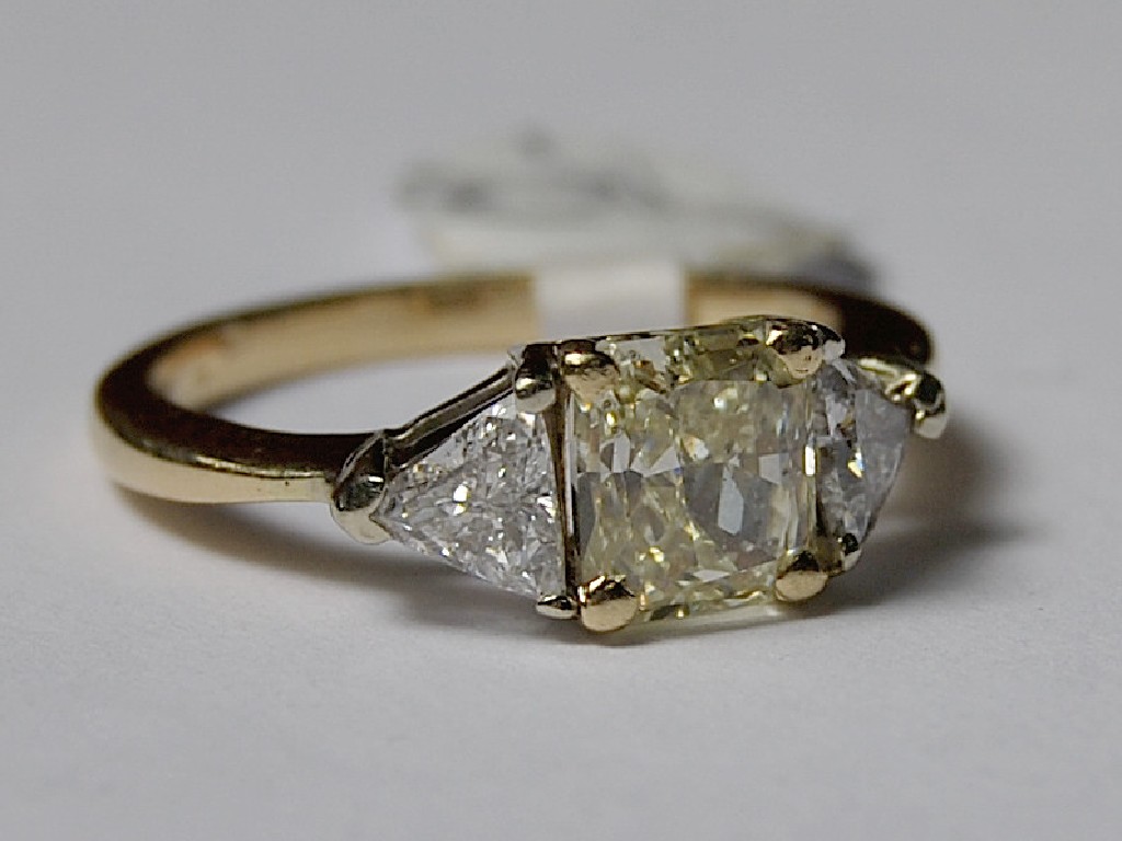 Appraisal: Modern square cut yellow diamond having triangular white diamond on