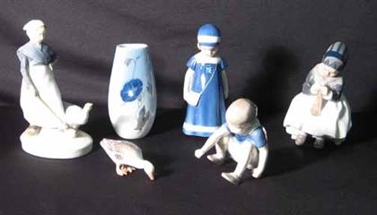 Appraisal: Group of four porcelain figures and bud vase royal copenhagen