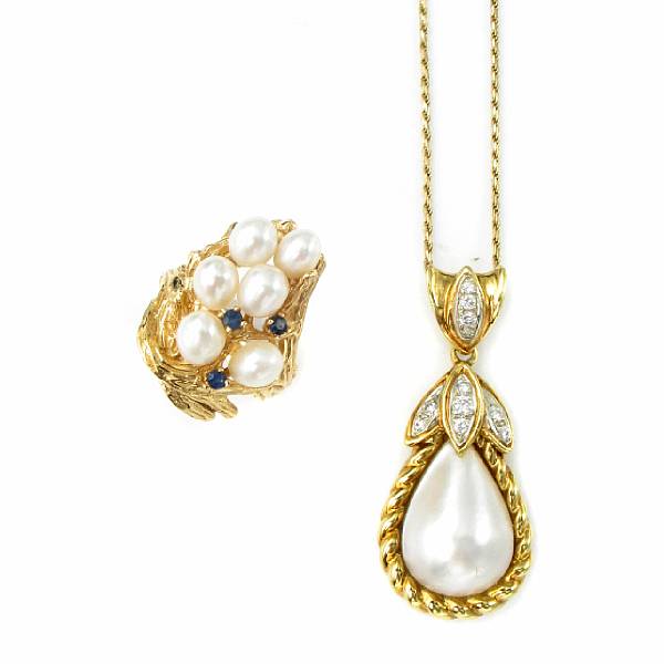 Appraisal: A mabe pearl diamond and gold pendant with chain and