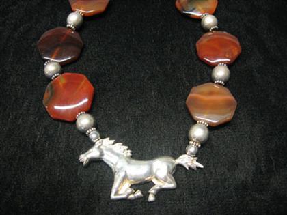 Appraisal: Agate and Mustang necklace Sterling mustang pendant offset with lovely