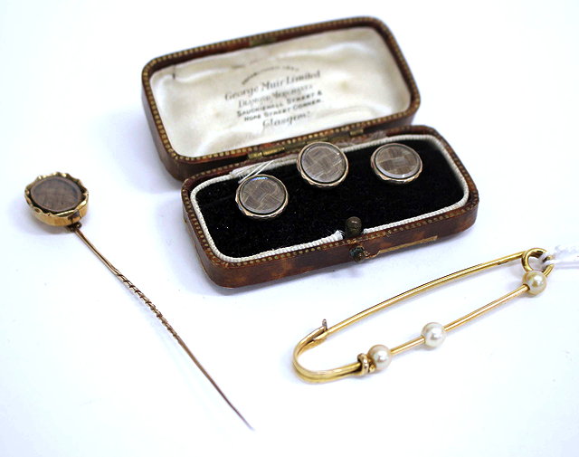 Appraisal: A YELLOW METAL PEARL SET PIN together with a hair