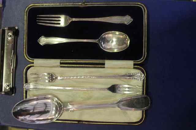 Appraisal: A CASED SILVER CHRISTENING SPOON AND FORK together with silver