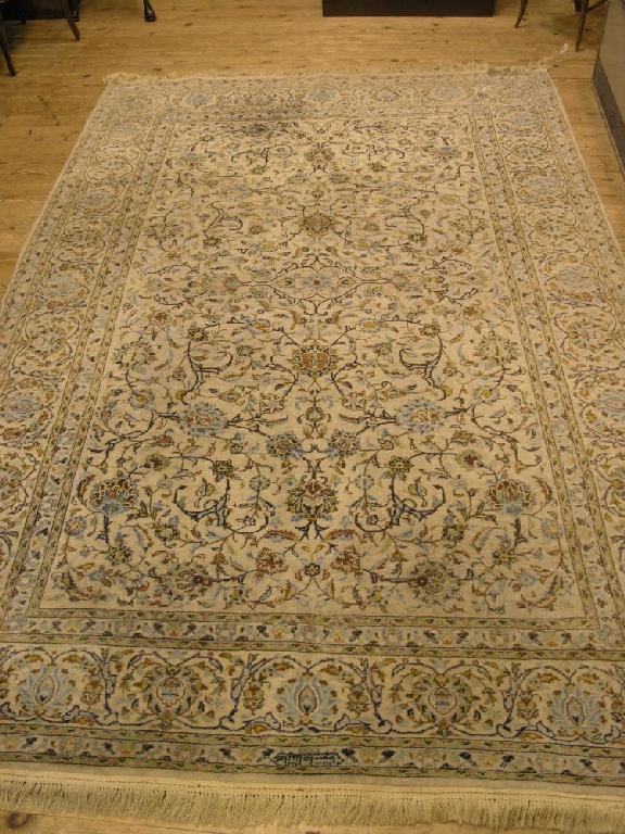 Appraisal: A Kashan rug floral patterns principally in blue and beige