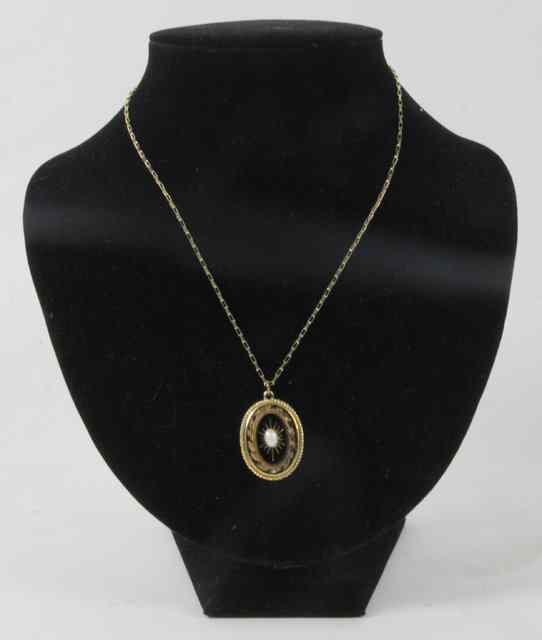 Appraisal: A mourning pendant on a ct gold fine link chain