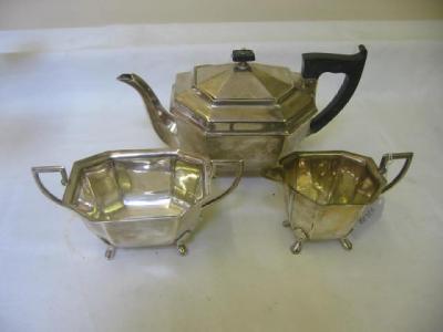 Appraisal: A THREE PIECE TEA SET of canted oblong form the