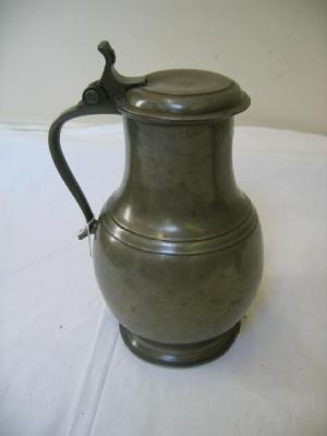 Appraisal: A LARGE DUTCH PEWTER FLAGON of bulbous form with mildly