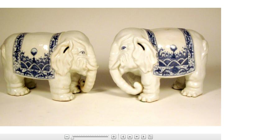 Appraisal: Pair of Hirado style porcelain elephant figuresNaturalistically potted blue glazed