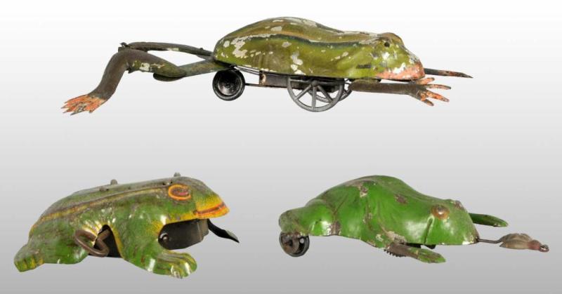 Appraisal: Lot of Tin Frog Wind-Up Toys Description German Working Includes