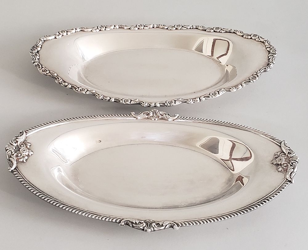 Appraisal: Two Silver Plate Oval Serving Platters Two Silver Plate Oval