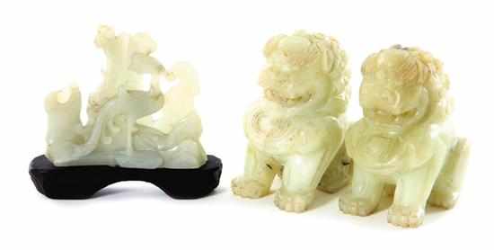 Appraisal: Chinese carved jade figures late Qing Dynasty pair of shishi