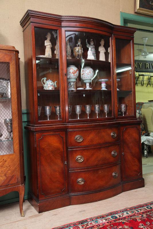 Appraisal: DREXEL BREAKFRONT CABINET Mahogany with a geometric carved cornice bowed