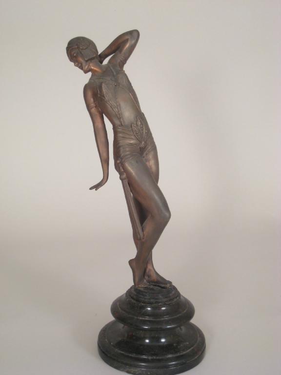 Appraisal: An Art Deco Figure of a female dancer on circular